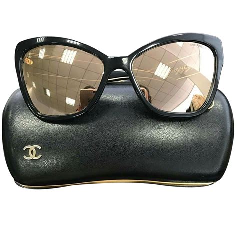 chanel cat eye shaped sunglasses|Chanel sunglasses with clear sides.